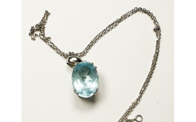 An 18ct white gold pendant, set with an oval faceted blue to...