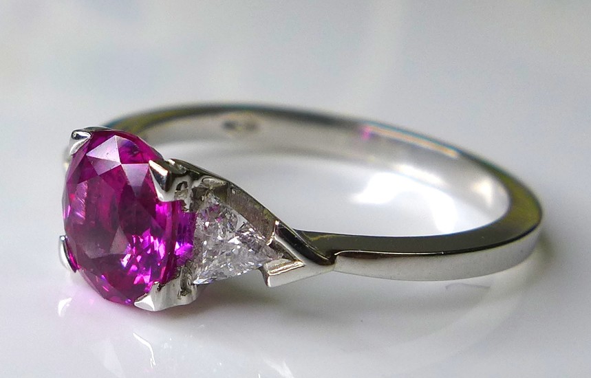 An 18ct white gold, pink sapphire and diamond dress ring, th...