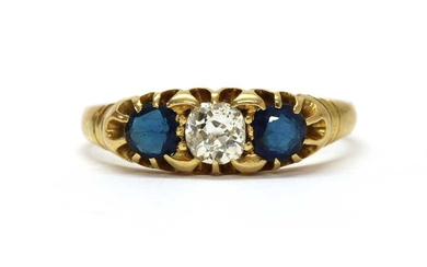 An Edwardian gold diamond and sapphire three stone ring
