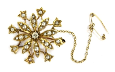 An Edwardian gold diamond and split pearl flower head brooch
