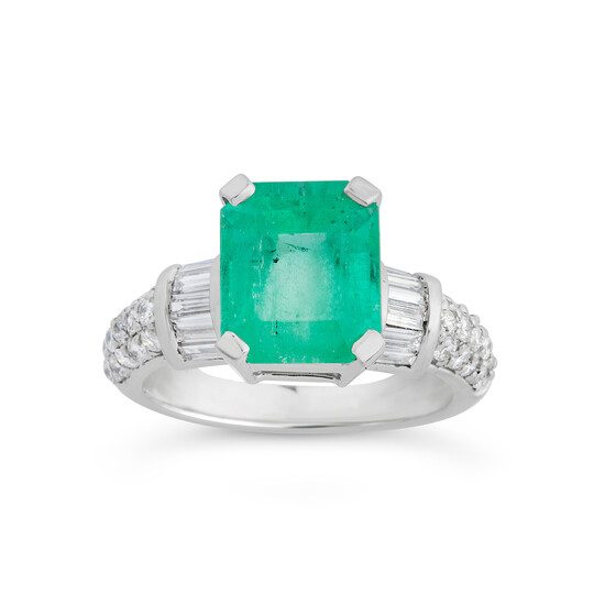 An Emerald, Diamond and White Gold Ring