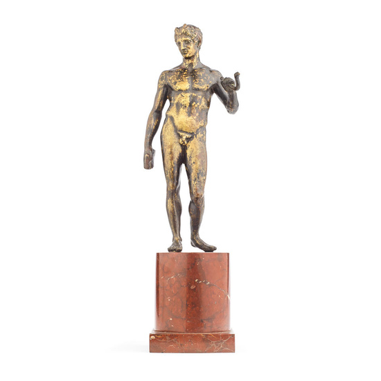 An Italian patinated bronze model of a young standing faun...