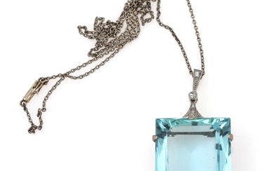 An aquamarine and diamond pendant set with a fancy-cut aquamarine weighing app....