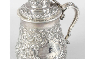 An early 19th century Georgian silver presentation tankard.