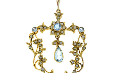 An early 20th century 15ct gold aquamarine, blue paste and split pearl articulated pendant.