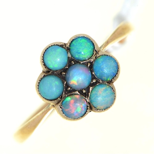 An opal cluster ring, c1900, in gold, 1.4g, size N...