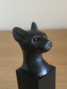 Ancient Egyptian Bronze head of a cat with glass eyes