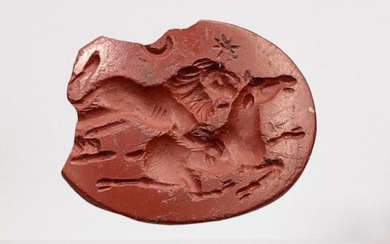 Ancient Roman JasperGemstone engraved with a Night Hunting Scene of a Lion attacking a Horse.Half Moon and a Star above
