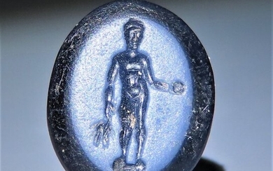 Ancient Roman nicolo intaglio depicting an athlete, published (book included). Exellent style.