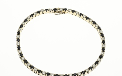 Bracelet de tennis en or blanc, 585/000, avec diamant et saphir. Bracelet de tennis serti...