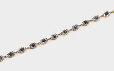 Bracelet fin saphir et diamants en or jaune, taille 750. Serti de saphirs bleu cornaline...
