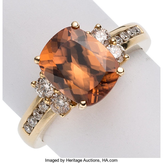 Brown Zircon, Diamond, Gold Ring The ring features a...