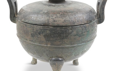 CHINESE ARCHAIC BRONZE TRIPOD CENSER (DING), WARRING STATES PERIOD (5TH-3RD CENTURY BCE) Height: 10 1/2 in. (26.7 cm.), Width over handles: 11 3/4 in. (29.8 cm.)