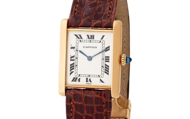 Cartier Paris. Attractive Tank Rectangular-shape Wristwatch in Yellow Gold, With Silver Roman Numbers Dial
