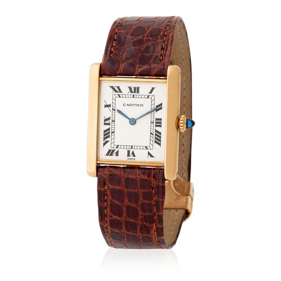 Cartier Paris. Attractive Tank Rectangular-shape Wristwatch in Yellow Gold, With Silver Roman Numbers Dial