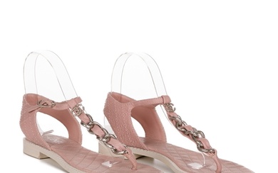 Chanel, a pair of chain-link thong sandals, crafted from pin...