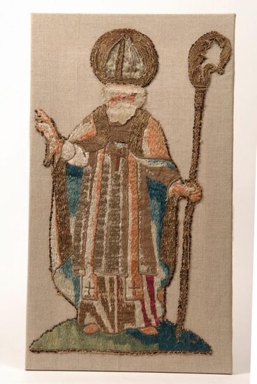 Collection composed of four orphreys or sconce figures in polychrome silk threads and silver threads representing a Virgin and Child, a holy bishop, a Virgin on a crescent moon and a Christ on the cross. 16th century. Respective dimensions: 58x32,5 cm...