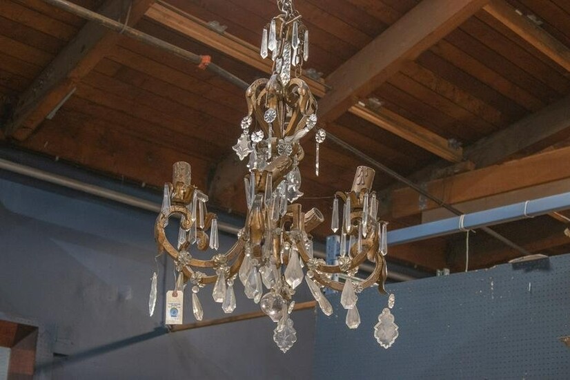 Continental crystal and patinated metal chandelier