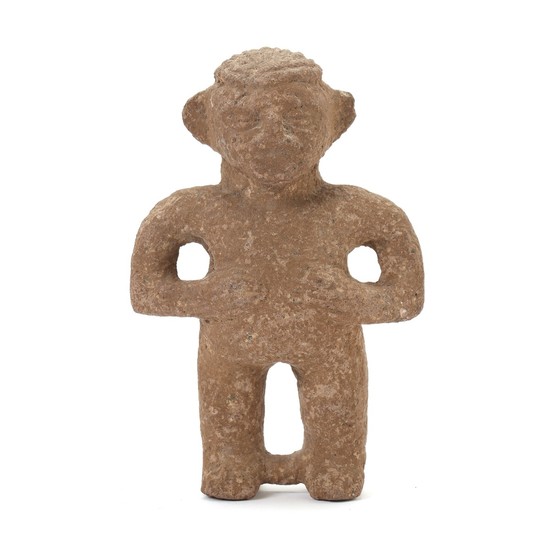 Costa Rica lava stone figure with brownish face standing with hands on belly. 1000–1400. H. 14