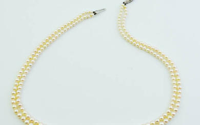 DOUBLE-STRAND CULTURED WHITE PEARL CHOKER WITH 9K WHITE GOLD CLASP....