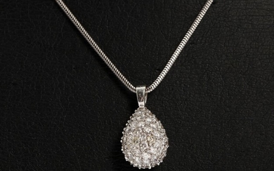 Diamond pendant set with numerous brilliant-cut diamonds, mounted in 18k white gold. A 14k white gold necklace included. Pendant L. 2.2 cm. 2008.