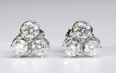 Diamonds gold earrings 18k white gold, each set with...