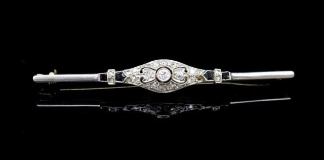 Edwardian sapphire and diamond set gold brooch of bar form w...
