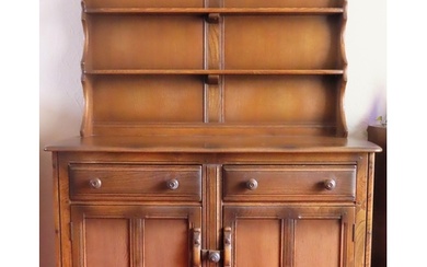 Ercol mid 20th century oak panelled kitchen dresser with pla...