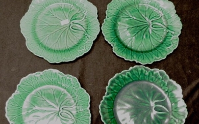 Four Wedgwood green leaf majolica plates