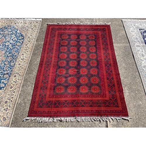 Hand knotted pure wool Afghan Kunduzi carpet, approx 290cm x...