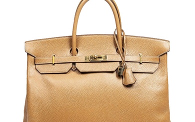 Hermès A “Birkin 40” bag of brown Ardennes leather with gold tone...