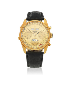 Heuer. An 18K gold manual wind triple calendar chronograph wristwatch with moon phase