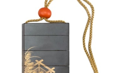 JAPANESE BLACK AND GOLD LACQUER FOUR-CASE INRO Rectangular, with grasses design. Signed. Length 3.5". Coral ojime.