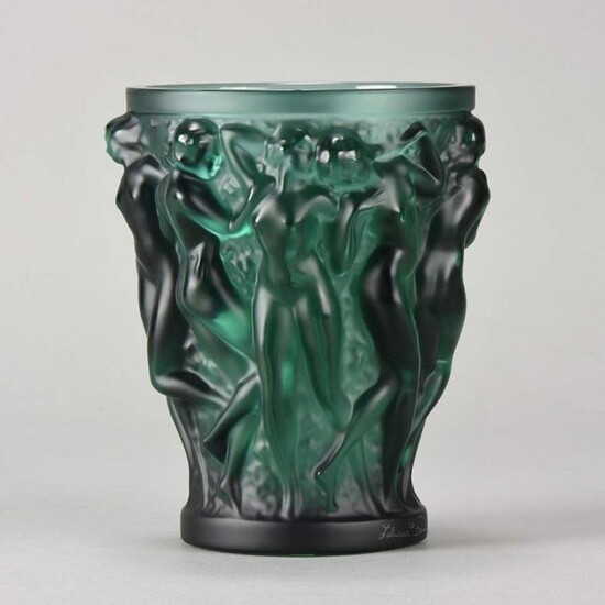 Lalique Glass Bacchantes Vase, deep green crystal glass vase decorated with raised dancing bacchantes around the circumference, signed Lalique France. Circa 2000. Height 14.5 cm.