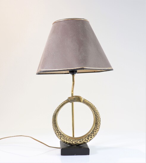 Lampe vintage décorée d'un serpent qui se mord la queue en bronze