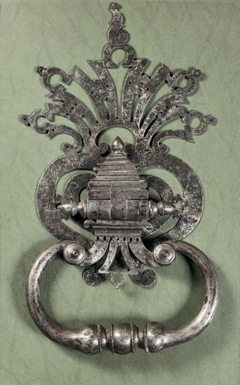 Large wrought-iron knocker decorated with twisted fillets and...