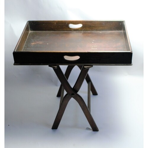 Late Victorian/ Edwardian oak butler tray with stand. With t...