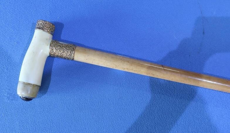 Late Victorian Malacca walking cane with gilt metal mounts...