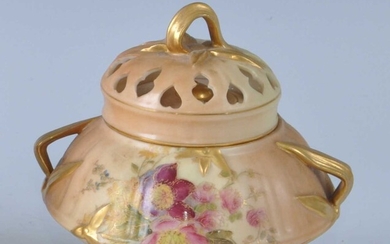 An Edwardian Royal Worcester porcelain blush ivory twin handled pot pourri jar and cover