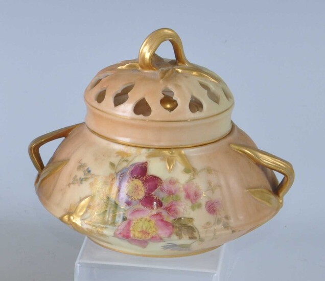 An Edwardian Royal Worcester porcelain blush ivory twin handled pot pourri jar and cover