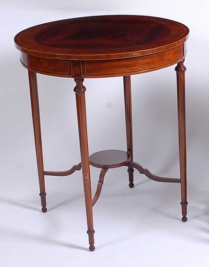 An Edwardian mahogany and inlaid centre table