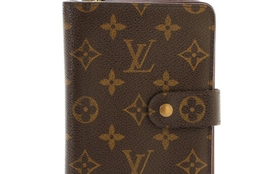 NOT SOLD. Louis Vuitton: A "Compact Zip Wallet" of brown monogram coated canvas with a...