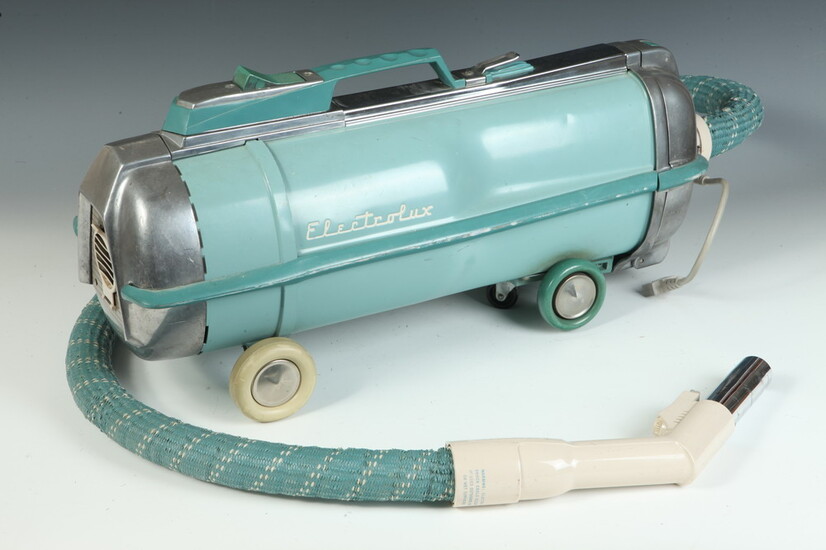 MID-CENTURY MODERN ELECTROLUX AUTOMATIC TURQUOISE VACUUM CLEANER. With eight Style...