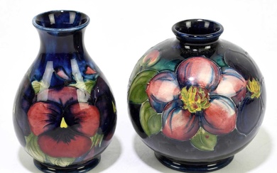 MOORCROFT; a 'Pansy' pattern vase, impressed marks, height 11.5cm, with...