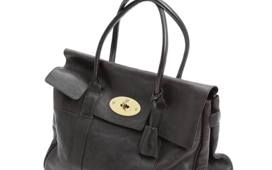 Mulberry A “Bayswater” bag of dark brown leather with gold tone hardware,...