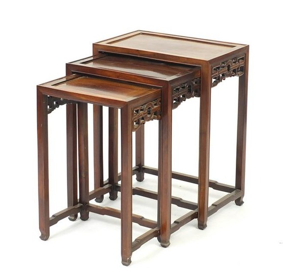 Nest of three Chinese hardwood occasional tables, the