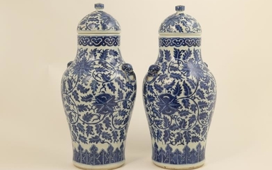 Pair Chinese blue and white lidded vases in Ming...