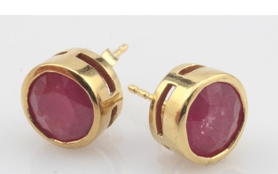Pair of 18ct yellow gold ruby earrings, two round rubies 7.5...