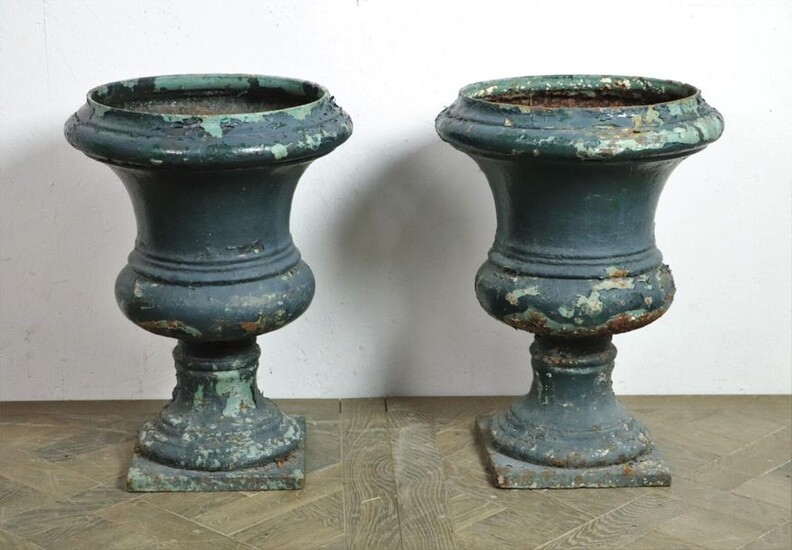 Pair of Medicis green cast iron garden vases.