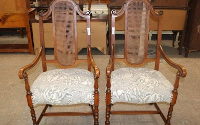 Pair of antique walnut frame scroll arm chairs with cane backs in the William and Mary style